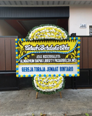 Papan Bunga Duka di Malifut